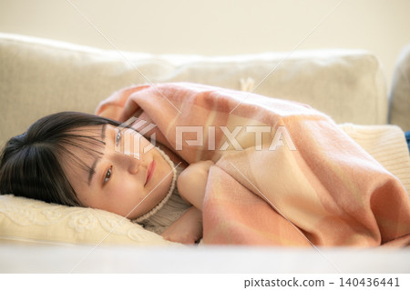 A young woman who has a cold A young woman who has a cold 140436441
