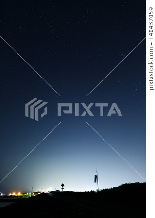 City lights and starry sky 140437059