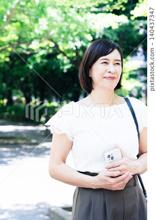 middle-aged women commuting to work middle-aged women commuting to work 140437347