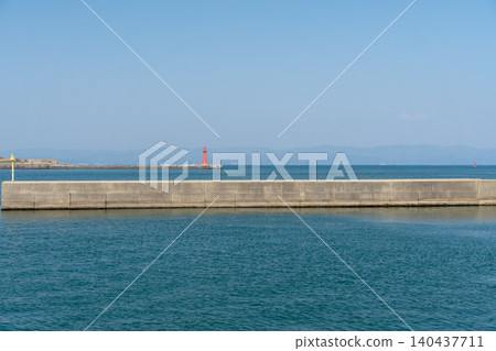 Blue sky, blue sea and white lighthouse Blue sky, blue sea and white lighthouse 140437711