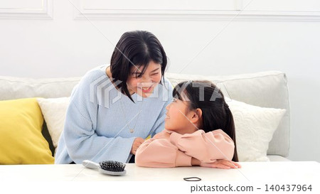 The image of tying your hair The image of tying your hair 140437964