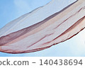 Cloth fluttering in the blue sky 140438694