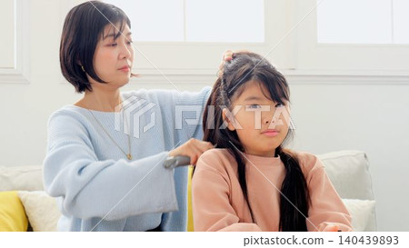 The image of tying your hair The image of tying your hair 140439893
