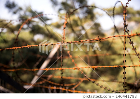 The barbed wire of the division of Korea The barbed wire of the division of Korea 140441788