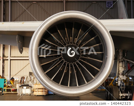 Engines of a Boeing B777 passenger plane parked in a hangar Engines of a Boeing B777 passenger plane parked in a hangar 140442323