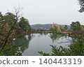Kasumigaike Pond and the beautiful snow-covered trees reflected on the surface of the water in Kenrokuen Garden, one of Japan's three most famous gardens (Kanazawa City, Ishikawa Prefecture) 140443319