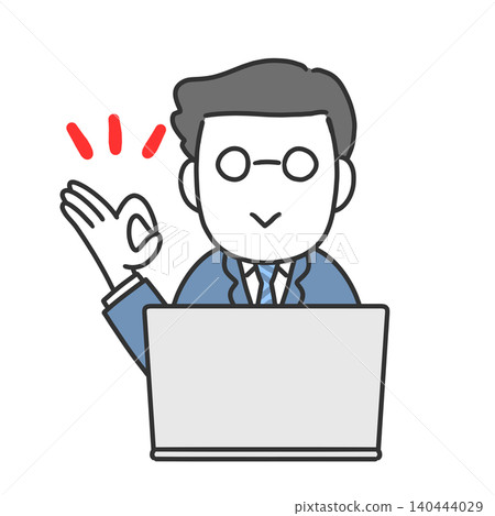 A man in a suit makes an OK sign in front of a computer. A man in a suit makes an OK sign in front of a computer. 140444029