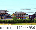 Kintetsu's sightseeing limited express train "Aoniyoshi" runs alongside the reconstructed ruins within the Heijo Palace Site, a World Heritage Site. 140444936