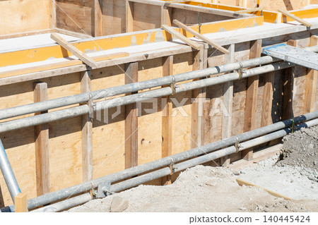 Construction of the foundation of a house, slab foundation, concrete, and concrete floor Construction of the foundation of a house, slab foundation, concrete, and concrete floor 140445424