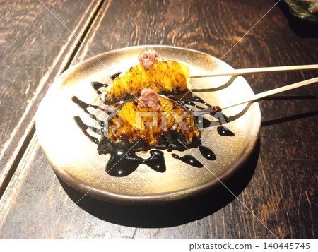Mandarin oranges on a skewer Mandarin oranges on a skewer 140445745
