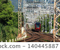 Front view of the Kintetsu Nara Line's "Hinotori" limited express train running through the Heijo Palace Site, a World Heritage Site. 140445887