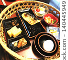 A luxurious Japanese breakfast to enjoy at a ryokan or hotel (grilled mackerel and egg roll served in a bamboo basket). 140445949