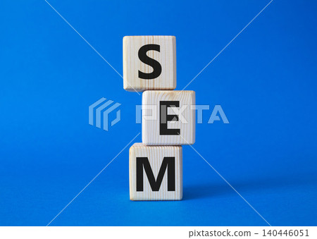 SEM - Search Engine Marketing symbol. Wooden cubes with words SEM. Beautiful blue background. Business and SEM concept. Copy space. SEM - Search Engine Marketing symbol. Wooden cubes with words SEM. Beautiful blue background. Business and SEM concept. Copy space. 140446051