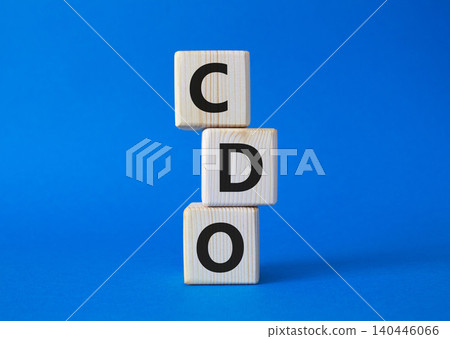 CDO - Collateralized Debt Obligation symbol. Wooden cubes with word CDO. Beautiful blue background. Business and Collateralized Debt Obligation concept. Copy space. CDO - Collateralized Debt Obligation symbol. Wooden cubes with word CDO. Beautiful blue background. Business and Collateralized Debt Obligation concept. Copy space. 140446066