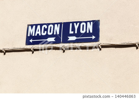 Lyon and Macon sign direction on a wall in France Lyon and Macon sign direction on a wall in France 140446863