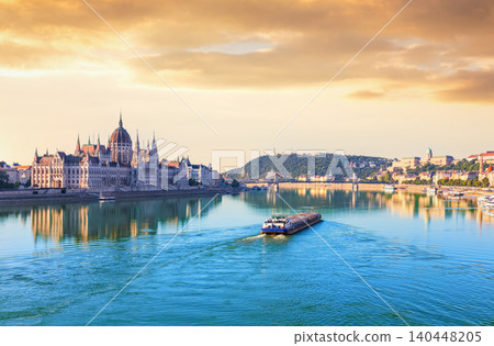 Hungarian Parliament Building at sunset with Danube river and historical bridges Hungarian Parliament Building at sunset with Danube river and historical bridges 140448205