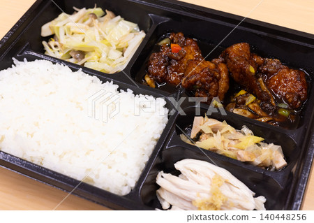 Delicious sweet and sour pork bento box Delicious sweet and sour pork bento box 140448256