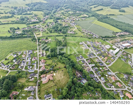 Aerial view of rural village and patchwork farmland Aerial view of rural village and patchwork farmland 140450293
