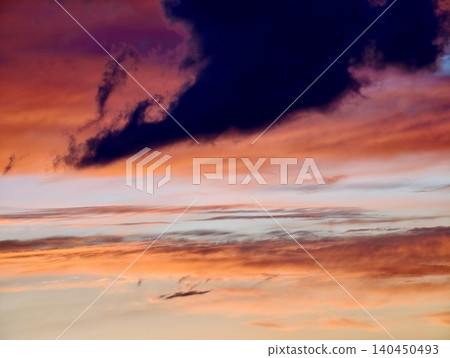 Dramatic sunset sky with glowing clouds Dramatic sunset sky with glowing clouds 140450493