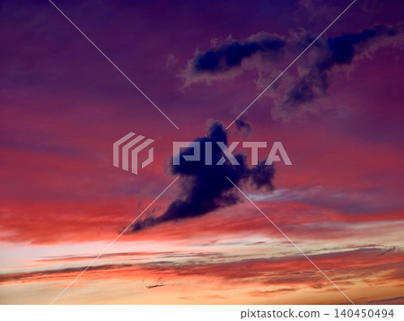 Dramatic colorful sunset sky with dark clouds Dramatic colorful sunset sky with dark clouds 140450494