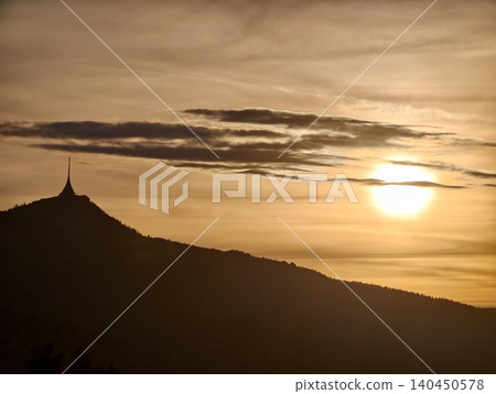 Golden sunset over mountain silhouette Golden sunset over mountain silhouette 140450578