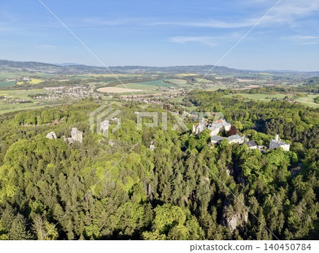 Hilltop Fortress Over Lush Landscape. Elevated Castle Surrounded By Verdant Woods And Valley 140450784