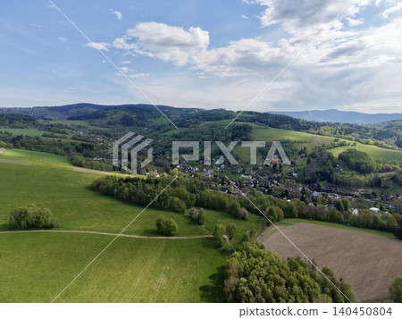 Rural Landscape With Winding Roads. Picturesque Countryside With Patchwork Fields And Lush Forests Rural Landscape With Winding Roads. Picturesque Countryside With Patchwork Fields And Lush Forests 140450804