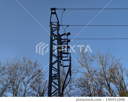 Metal Tower Scene. Electrical Poles And Wires Symbolizing Sustainable Energy Development In Countryside 140451006