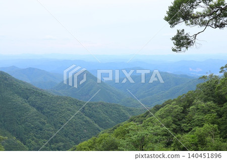 The mountain range of Mt. Oe, a spectacular early summer view of Fukuchiyama, Kyoto. The mountain range of Mt. Oe, a spectacular early summer view of Fukuchiyama, Kyoto. 140451896