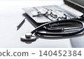 Healthcare background of stethoscope laptop glasses and pen on table with copy-space 140452384