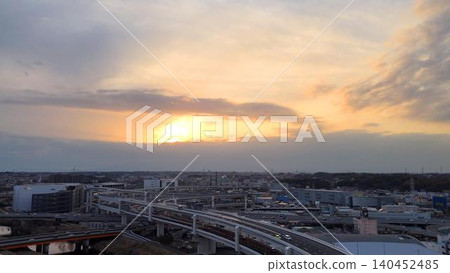 Light filtering through the clouds at dusk and a massive junction 140452485