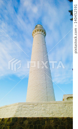 white lighthouse in the blue sky white lighthouse in the blue sky 140452591
