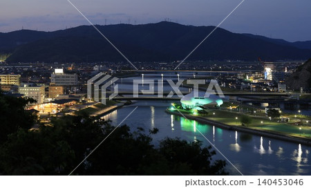 A night view of Ishinomaki City, Miyagi Prefecture, as seen from Hiyoriyama Park, showing the illuminated Ishinomori Manga Museum. A night view of Ishinomaki City, Miyagi Prefecture, as seen from Hiyoriyama Park, showing the illuminated Ishinomori Manga Museum. 140453046