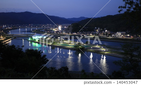 A night view of Ishinomaki City, Miyagi Prefecture, as seen from Hiyoriyama Park, showing the illuminated Ishinomori Manga Museum. A night view of Ishinomaki City, Miyagi Prefecture, as seen from Hiyoriyama Park, showing the illuminated Ishinomori Manga Museum. 140453047