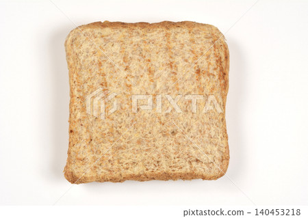 Single slice of whole wheat toast isolated on white background Single slice of whole wheat toast isolated on white background 140453218