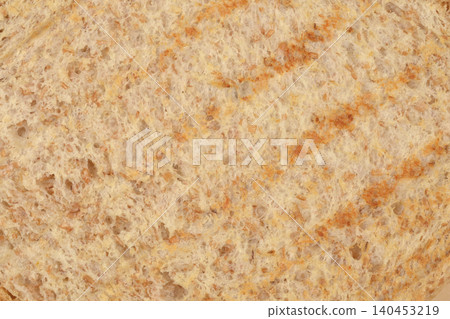 Toasted whole wheat bread surface diagonal texture Toasted whole wheat bread surface diagonal texture 140453219