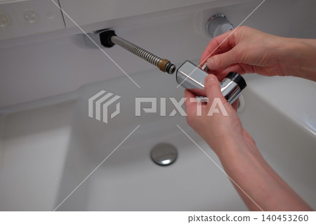 Removed shower head on the sink Removed shower head on the sink 140453260