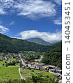 A spectacular panoramic view of the Shirakawa-go Gassho-zukuri village under the summer sky. 140453451