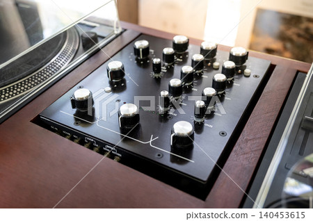 Audio mixer with knob button. Sound mixing console or soundboard panel in music recording studio Audio mixer with knob button. Sound mixing console or soundboard panel in music recording studio 140453615