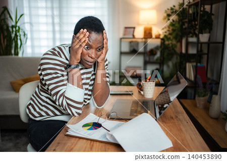Stressed adult man managing financial problems and worrying about debt 140453890