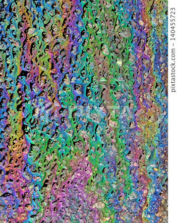 A leaked Car Oil Petrol in The Rain on a Tarmac Road Metallic Rainbow A leaked Car Oil Petrol in The Rain on a Tarmac Road Metallic Rainbow 140455723