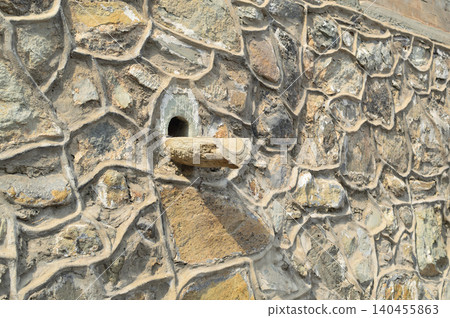 Rustic stone wall texture with small niche 140455863