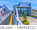 A view of Sagamihara city in Japan, including JR Yokohama Line's Fuchinobe Station and Obirin University in front of the station (21st). 140456121
