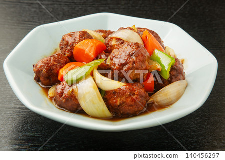 Sweet and sour pork-style meatballs 140456297