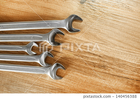 Combination Spanner Wrench Jumbo Chrome Vanadium Steel. Working tools on wooden background. Combination Spanner Wrench Jumbo Chrome Vanadium Steel. Working tools on wooden background. 140456388