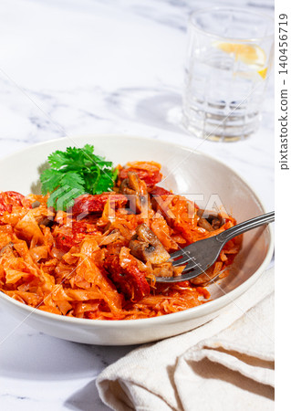 Bigos, Polish dish bigos, on a marble table, stewed meat with cabbage, chorizo sausages, mushrooms, homemade, without people, Bigos, Polish dish bigos, on a marble table, stewed meat with cabbage, chorizo sausages, mushrooms, homemade, without people, 140456719