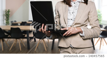businesswoman using tablet in office businesswoman using tablet in office 140457565
