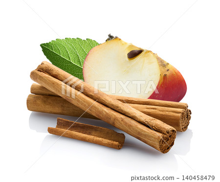 Apple slice with cinnamon bark in closeup Apple slice with cinnamon bark in closeup 140458479