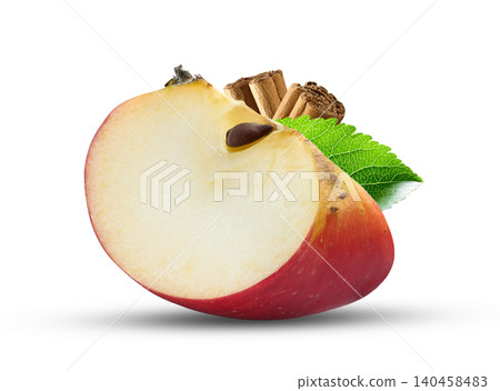 Apple slice with cinnamon bark in closeup Apple slice with cinnamon bark in closeup 140458483