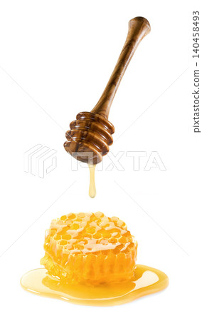 Honeycomb with honey on white background Honeycomb with honey on white background 140458493